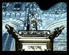 rivertext > The Castle has no gates. I continued inside to find that the top of the Cathedral was illluminated by lights with a different color temperature than its base.